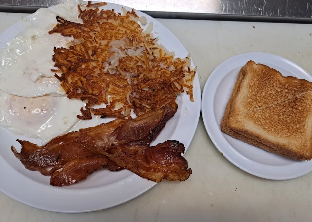 4 Bacon 2 Eggs Hashbrowns and Toast